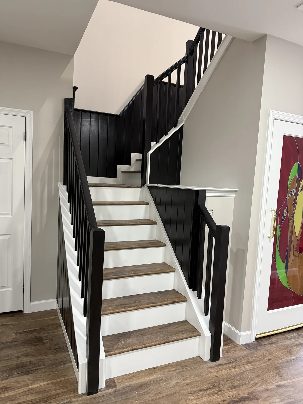 Modern Contrast Staircase with Matte Black Railings in Moorestown NJ